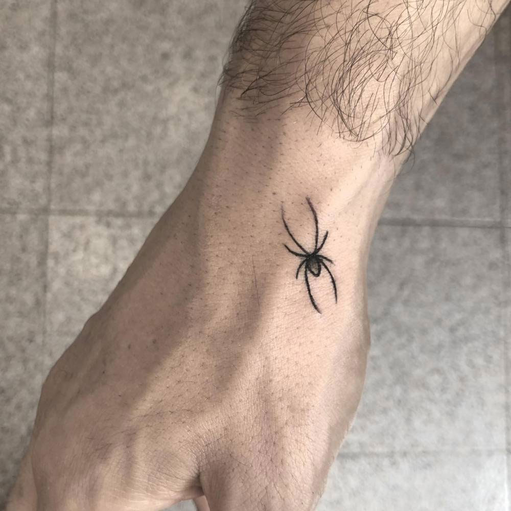 تاتو عنکبوت روی دست